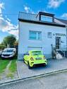 sowie Stellplätzen und Garage - 