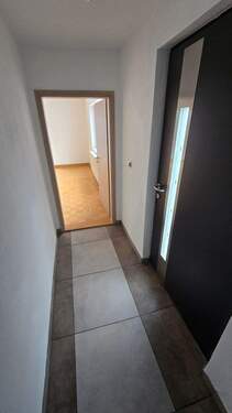 Eingang Windfang - Mehrfamilienhaus, Wohnhaus mit 130,00 m&sup2; in München zum Kaufen