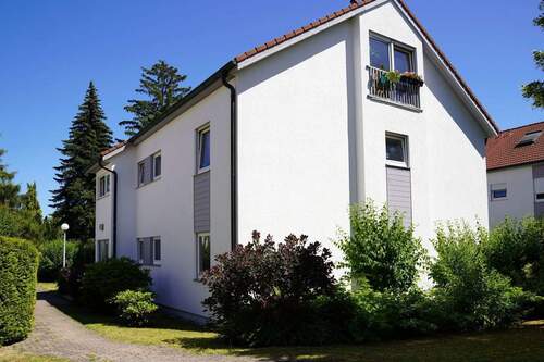 Hausansicht - Stilvolle 3-Zimmer-Wohnung mit Terrasse inkl. Gartenanteil und individuellem Gestaltungspotenzial