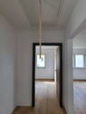 Bild 1 - Erstbezug: Helle 2-Zi-DG-Wohnung mit Carport und E-Ladestation