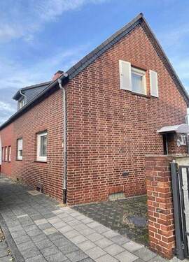 Vorderansicht - 3 Zimmer Doppelhaushälfte zum Kaufen in Dormagen