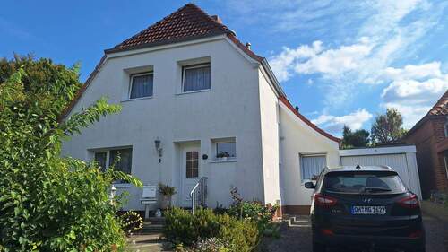 165 Ansicht - Einfamilienhaus mit Garage und großem Gartenhaus