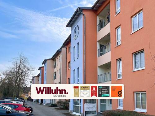 Außenansicht - Wohnen mit Komfort: 3-Raumwohnung mit Parkett, 2 Balkonen & Tiefgarage