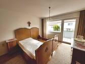 Schlafzimmer mit Zugang zum Balkon - 
