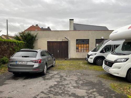 Grundstücksansicht mit Halle - Grundstück mit Halle zentral Oldentrup