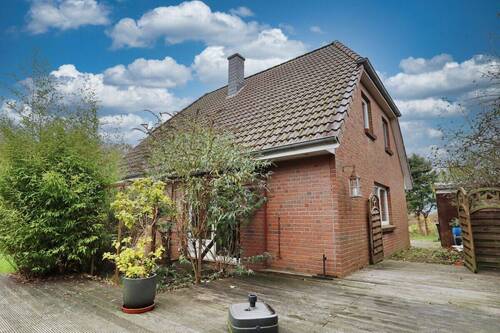 Terrasse - Einfamilienhaus mit 111,60 m² in Sarlhusen zum Kaufen