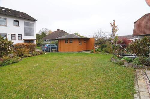 Garten mit Gartenhütte - Einfamilienhaus mit 115,00 m&sup2; in Bad Staffelstein zum Kaufen