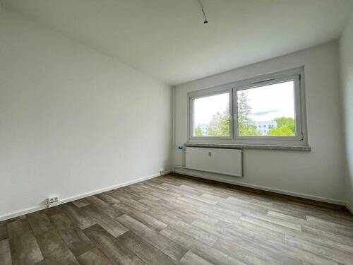 Schlafzimmer - Familienfreundliches Wohnen in Chemnitz-Kappel: Erstbezug mit Balkon