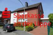 Ansicht mit Garage - 3-FAMILIENHAUS IN BRAMBAUER - 629.000,00 EUR Kaufpreis, ca.  303,00 m² Wohnfläche