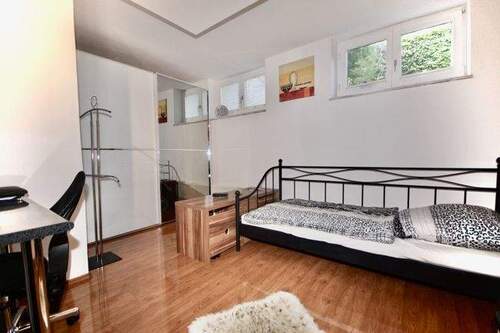 Schlafzimmer 1 im Souterrain - 