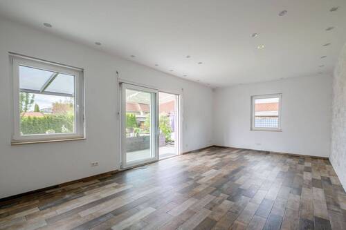 Wohnzimmer im Erdgeschoss - Einfamilienhaus mit 121,00 m&sup2; in Brieselang zum Kaufen