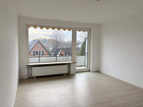 Wohnzimmer mit Balkon - 