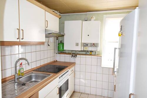 Küchenbereich mit Heizungsanlage - 