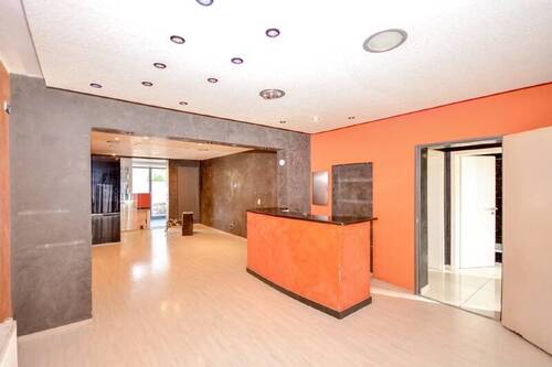 Ladenlokal - 4 Zimmer Mehrfamilienhaus, Wohnhaus zum Kaufen in Wesseling