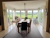 Wohn- und Esszimmer mit Wintergarten - 