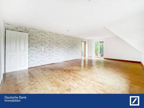 Wohnzimmer - Top-Lage in Leteln: 3-Zimmer-Wohnung mit Stil und Nachhaltigkeit
