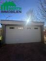 Garage Front - Einfamilienhaus mit 98,00 m&sup2; in Nordstrand zum Kaufen