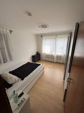 Schlafzimmer - Mehrfamilienhaus, Wohnhaus mit 124,00 m&sup2; in Stuttgart zum Kaufen