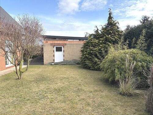 Nebeneingang Garage und Garten - 