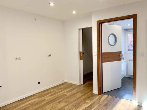 und großzügige Wohn-, Ess- und Küchenbereich. - 