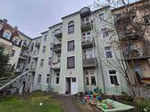 Gebäudeansicht / Rückseite - Etagenwohnung mit 60,70 m² in Dresden zum Kaufen