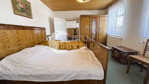 Schlafzimmer im Obergeschoss mit Wohncharme - 