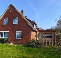 Berne-Ranzenbüttel: Einfamilienhaus mit Modernisierungsbedarf und großem Grundstück!