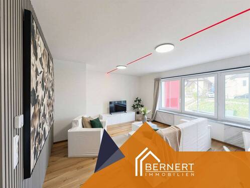 Wohnzimmer - A+ Energieeffiziente 3-Zimmer-Wohnung mit hochwertigem Ausbaustandard - Erstbezug nach Sanierung