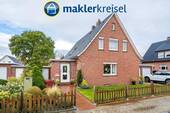 Titelbild - Jever: solides Einfamilienhaus mit Doppelgarage in toller Lage
