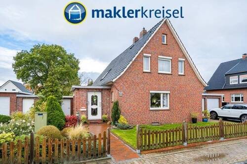 Titelbild - Jever: solides Einfamilienhaus mit Doppelgarage in toller Lage