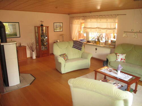 Wohnzimmer - Einfamilienhaus mit 202,00 m&sup2; in Krumstedt zum Kaufen