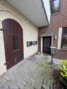 Hauseinang zu den Erdgeschosswohnungen sowie zur Einzimmerwohnung - 1 Zimmer Mehrfamilienhaus, Wohnhaus zum Kaufen in Stuhr