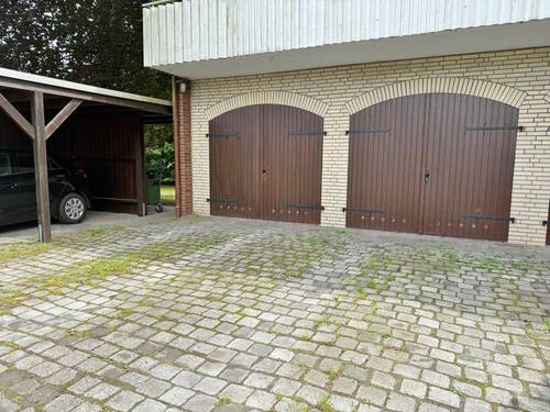 vermietete Garagen - 1 Zimmer Mehrfamilienhaus, Wohnhaus in Stuhr
