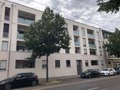 Gebäudeansicht - Moderne 3-Raumwohnung mit eigenem Gartenanteil