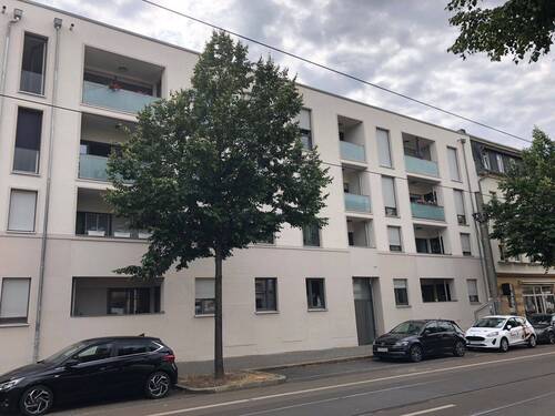 Gebäudeansicht - Moderne 3-Raumwohnung mit eigenem Gartenanteil