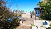 Bungalow u. Terrasse am Teich - 