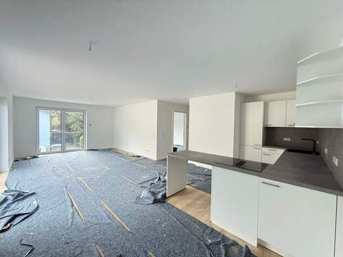 Wohnzimmer - Moderne 3 Zi.-Wohnung zum Erstbezug in ruhiger Lage