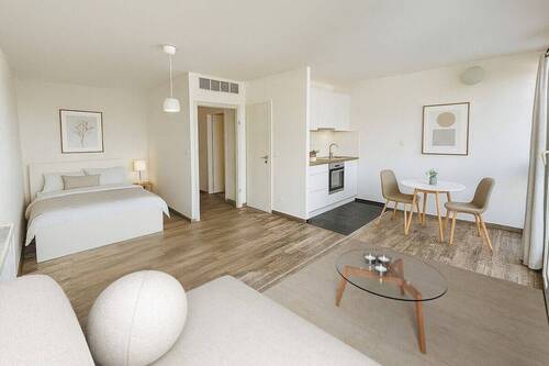 Wohn- und Schlafzimmer - Einrichtungsbeispiel - 1 Zimmer Terrassenwohnung zum Kaufen in München