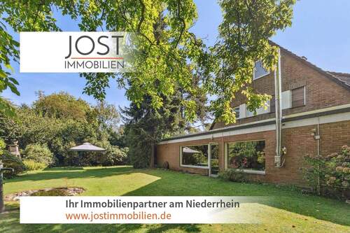 Gartenansicht - Wohnen am Schmölderpark - Freistehendes Einfamilienhaus mit großem Garten.