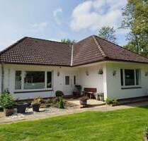 Gepflegter Winkelbungalow mit Wintergarten und Hauskoppel in Wiemerstedt