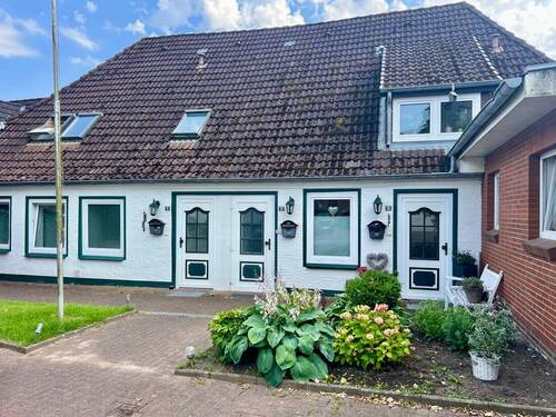 Außenansicht - 1 Zimmer Mehrfamilienhaus, Wohnhaus in Wöhrden