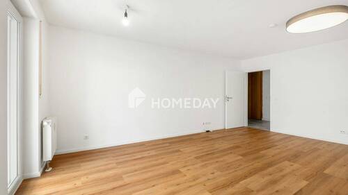 Wohnzimmer 2 - 2 Zimmer Etagenwohnung zum Kaufen in Kirchheim b. München