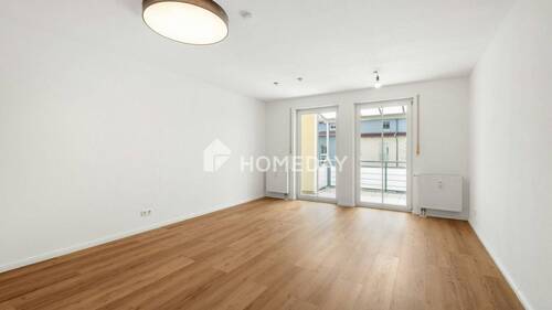 Wohnzimmer 1 - 2 Zimmer Etagenwohnung in Kirchheim b. München