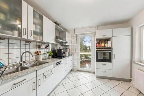 Küche mit Zugang zum Garten (KI generiert) - Einfamilienhaus mit 98,00 m&sup2; in Hürth zum Kaufen