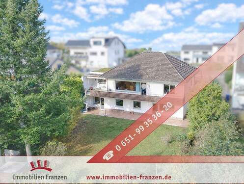 Titelbild - Einfamilienhaus mit Traumgarten, Garage & Carport!