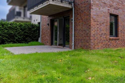 Außenansicht - Etagenwohnung mit 66,00 m² in Moormerland zum Kaufen