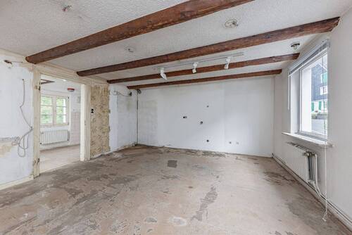 Ladenlokal 2 EG: Verkaufsraum mit Lagerfläche - 