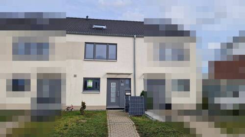 Frontansicht - Modernes Reihenmittelhaus im Neubaugebiet von Neubeckum mit Garten und KfW-55-Standard