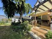 Gemütliche Terrasse mit Zugang zum Garten - 