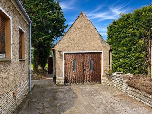 Garage mit angeschlossenem Nebengelass - 
